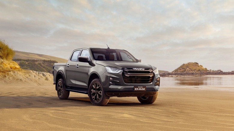 2024 Isuzu D_MAX parked on an empty beach