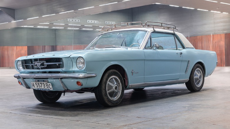 A Ford Mustang hard top in blue