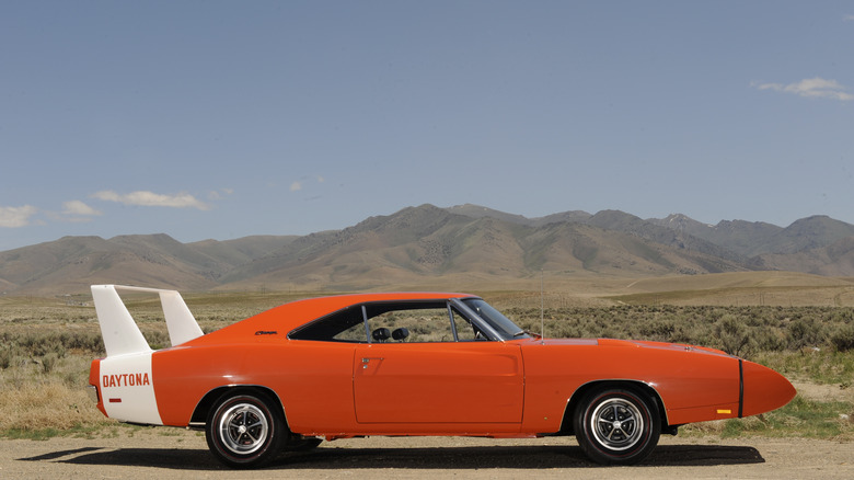 An orange and white Dodge Charger Daytona