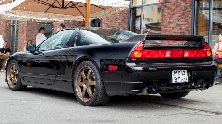 Black Honda NSX parked on street