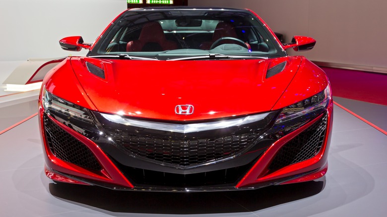 Red 2016 Honda NSX on showroom floor