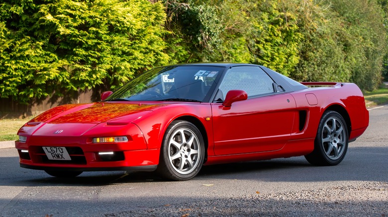 Red 1995 Honda NSX parked