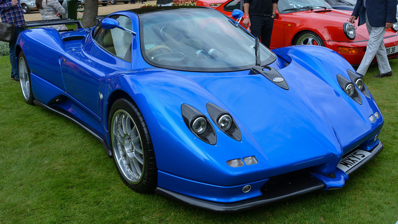 A blue Pagani Zonda S at a car show