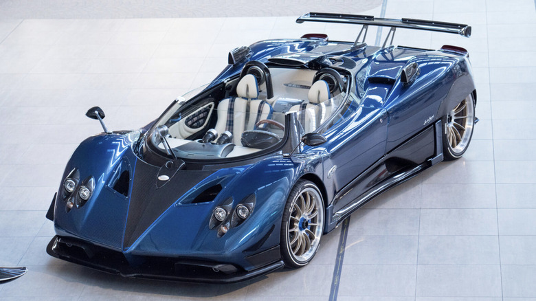 A Pagani HP Barchetta on a showroom floor