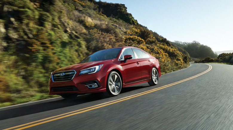 2019 Subaru Legacy 3.6R driving on an open road front 3/4 view