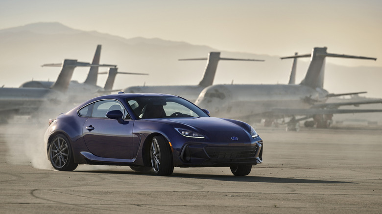 2025 Subaru BRZ drifting on an airfield front 3/4 view