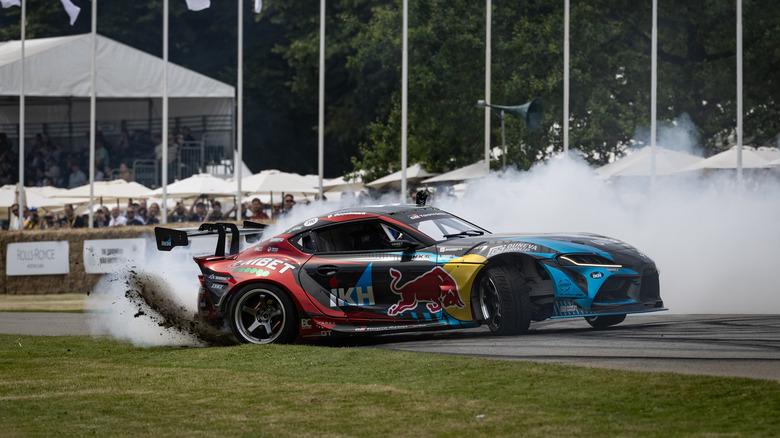 Toyota Supra drifting on track