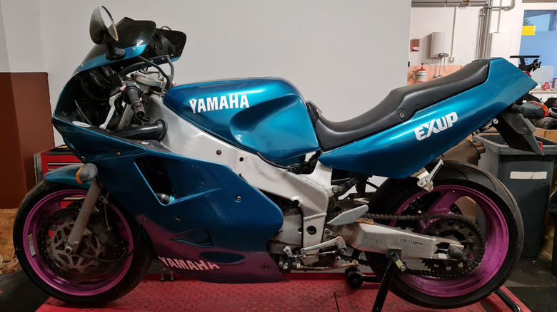 Green Yamaha YZF Exup motorcycle on stand