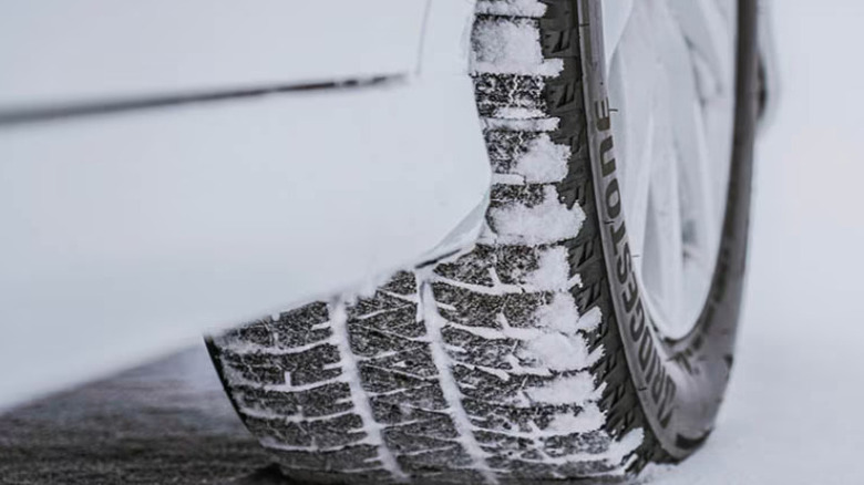 Bridgestone tire on snowy road