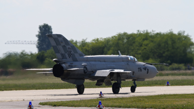 MiG-21 fighter plane on runway