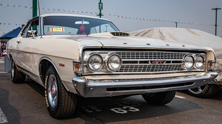 A white 1968 Ford Fairlane in a parking lot