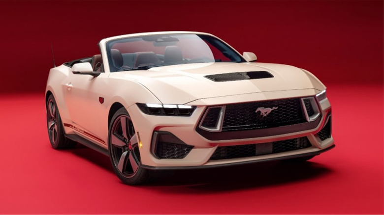 A press image of a white Ford Mustang convertible