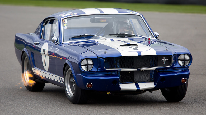 1965 Shelby GT350 driving in a race