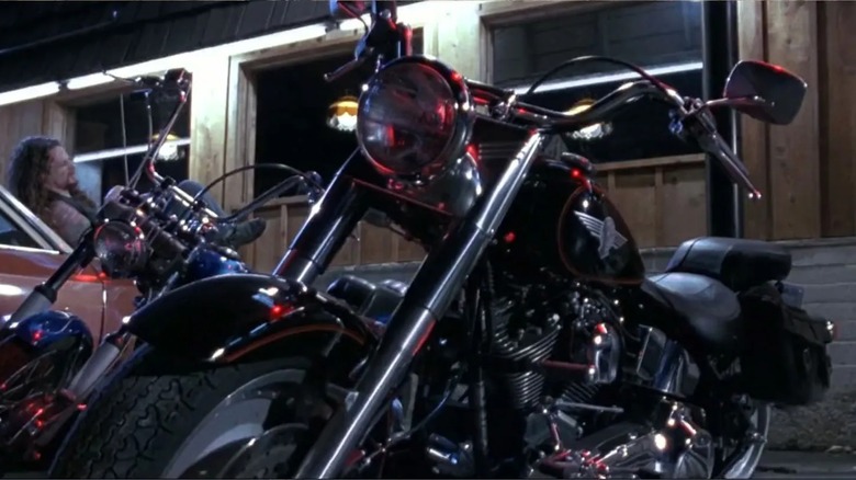 Harley Davidson Fatboy in front of a bar in Terminator 2