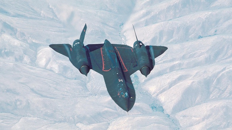 SR71 Aircraft in flight over canyon