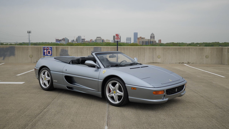 Grey Ferrari 355 Serie Fiorano Spider parked on an empty parking lot