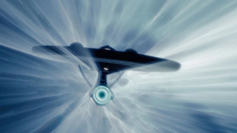 The Enterprise using its warp drive