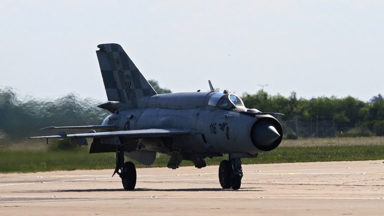 Mig 21 fighter jet on tarmac