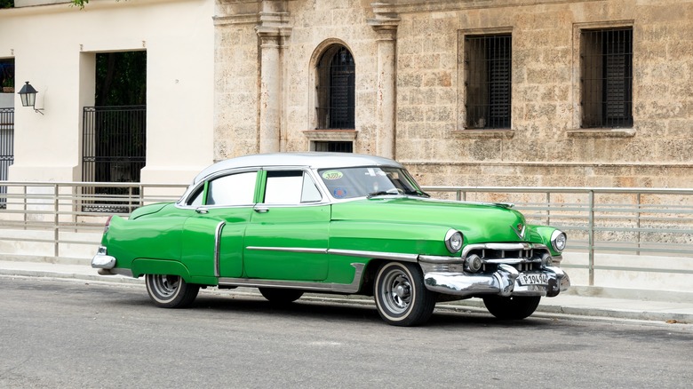 A green Cadillac Series 62 that originally came with a 331 ci engine