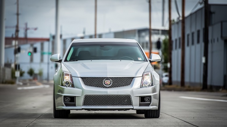 A gray Cadillac CTS-V on a race track