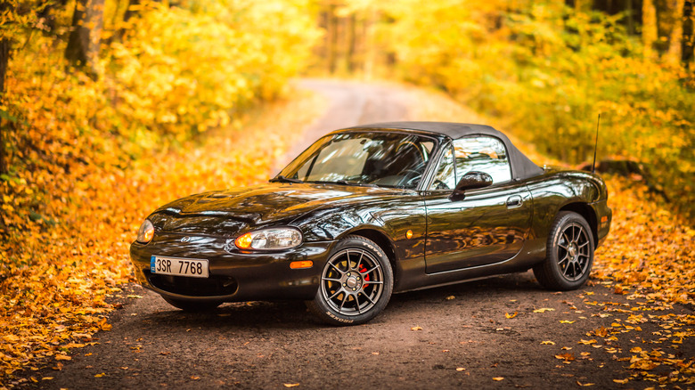 Mazda MX-5 Miata with trees