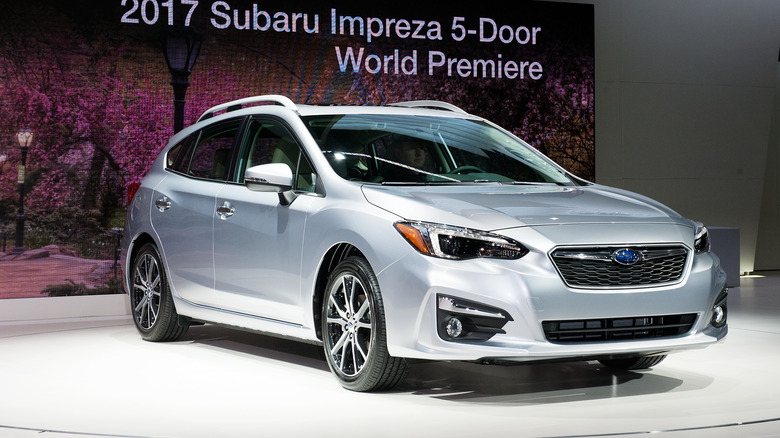 Silver Subaru Impeza on show floor