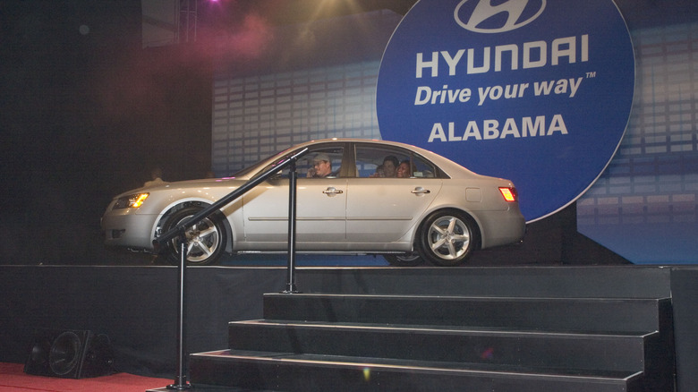 A 2005 Hyundai Sonata on a stage