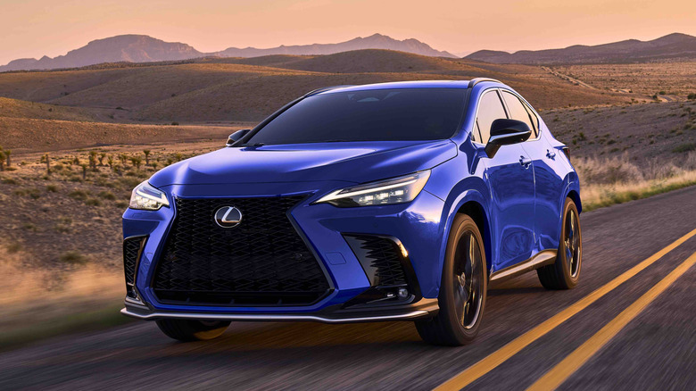 Blue 2024 Lexus NX 450h on the road