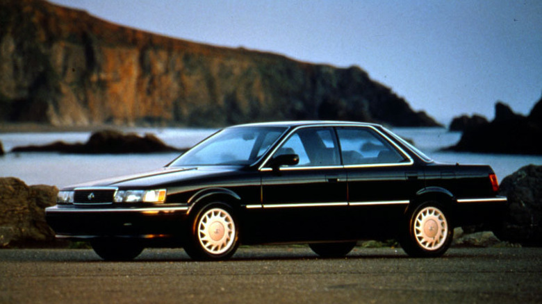 First-gen 1990 Lexus ES 250 front 3/4 view parked on a beach