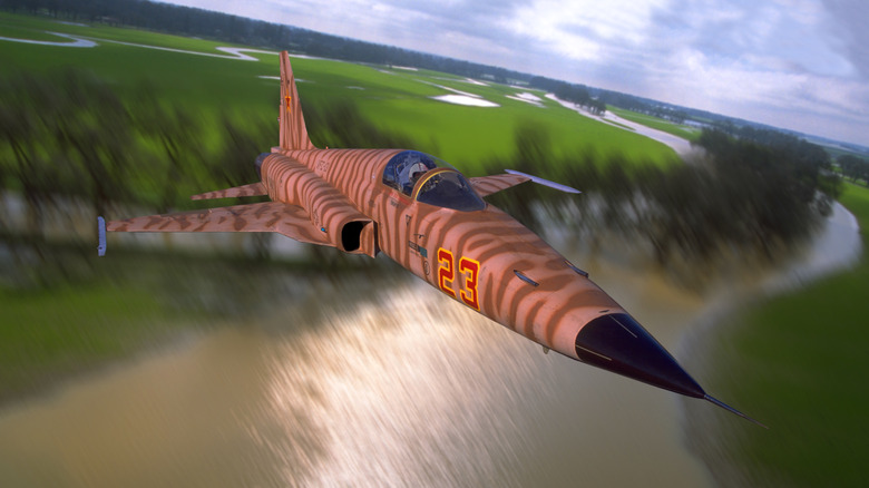 1970s USAF Northrop F-5E Tiger Ii Flying Over River