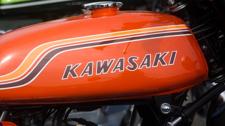 Orange vintage kawasaki gas tank