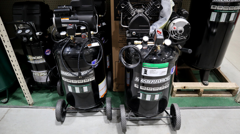 Two Masterforce-branded air compressors in store