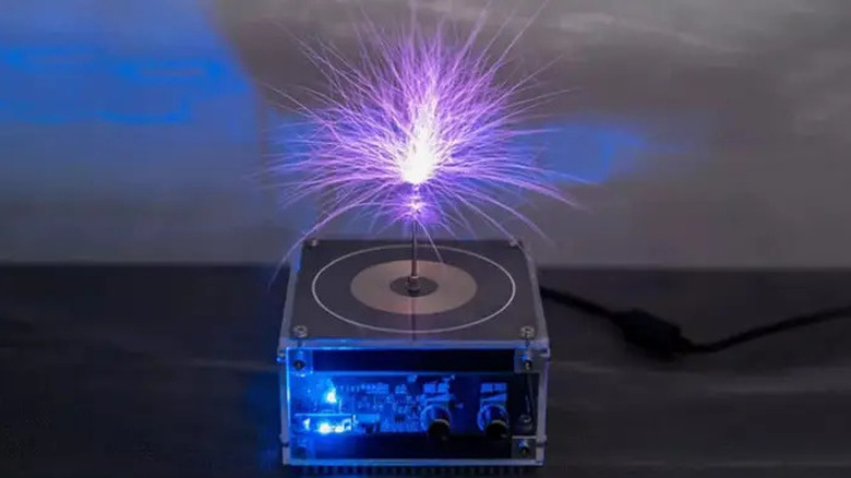 Tesla coil speaker illuminating