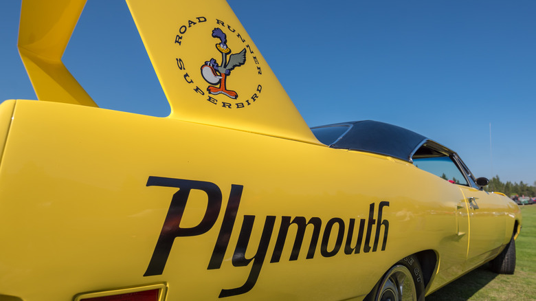 Yellow Plymouth Superbird wing and quarter panel with decals