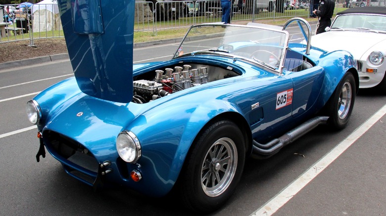 Blue Shelby 427 Cobra S/C Continuation Series car with hood open