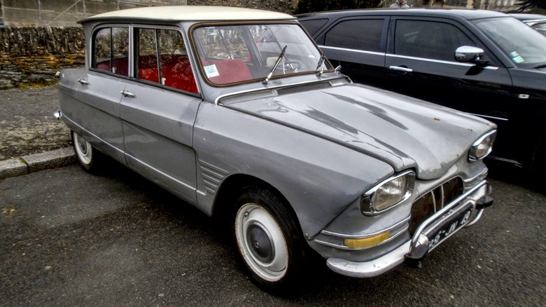 Silver Citroën Ami 6 reverse parked