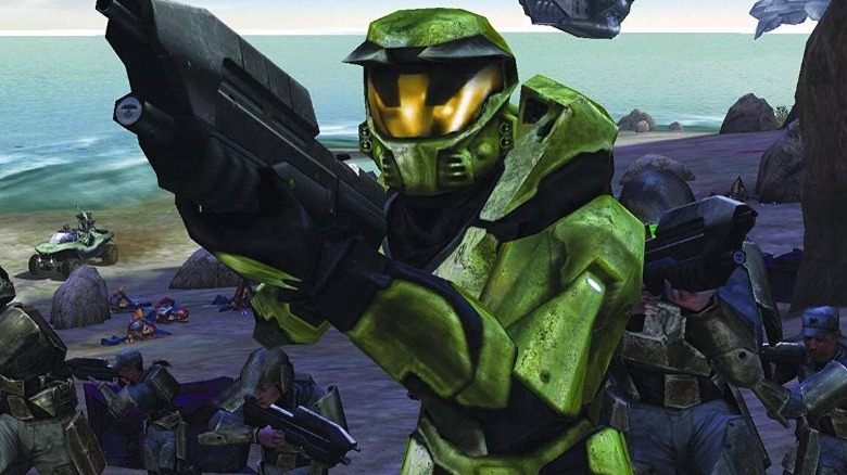 Master Chief aiming his gun with fellow marines