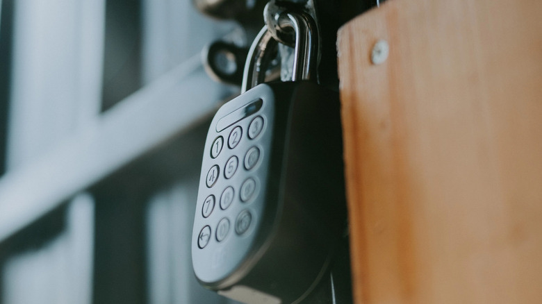 A smart padlock on a shed door