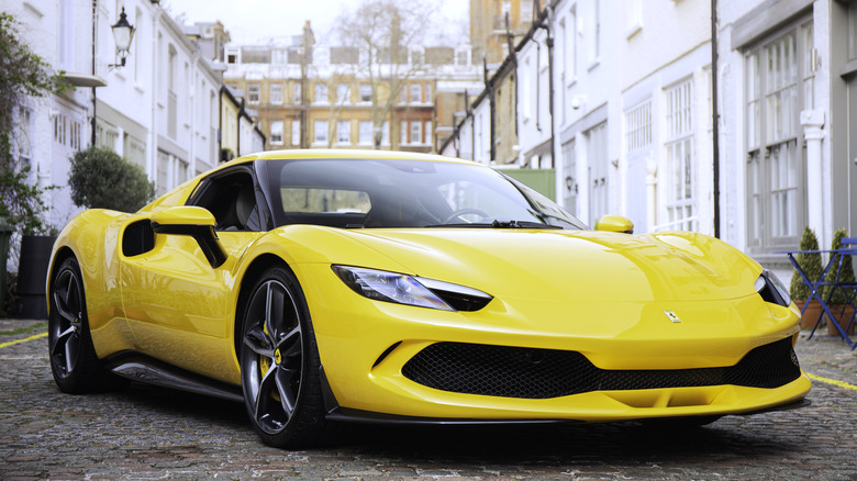 The Ferrari 296 GTB in yellow, front 3/4 view