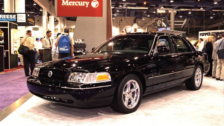 The Mercury Marauder concept car in black on a show floor, front 3/4 view