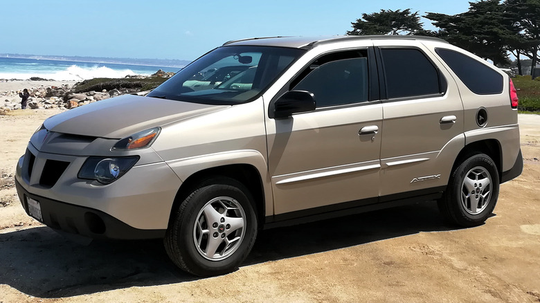 Pontiac Aztek parked beach