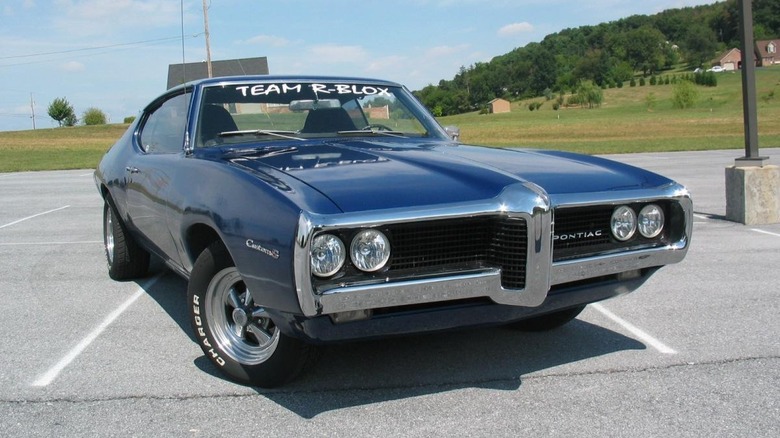 Black 1969 Pontiac Custom S parked