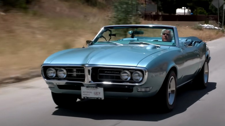 Silver 1968 Pontiac Firebird Sprint on the road