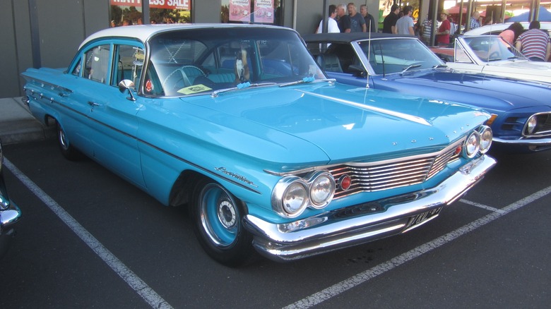 Light blue 1960 Pontiac Laurentian parked