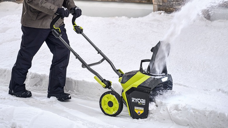 Ryobi 18 Inch Snow Blower throwing snow