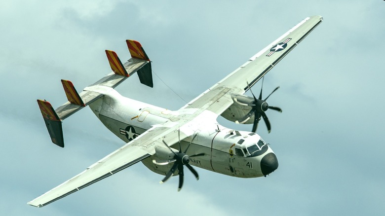 C-2 Greyhound in flight over cloudy skies