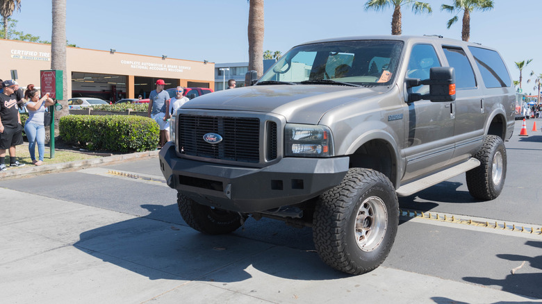 Lifted Ford Excursion at a car show