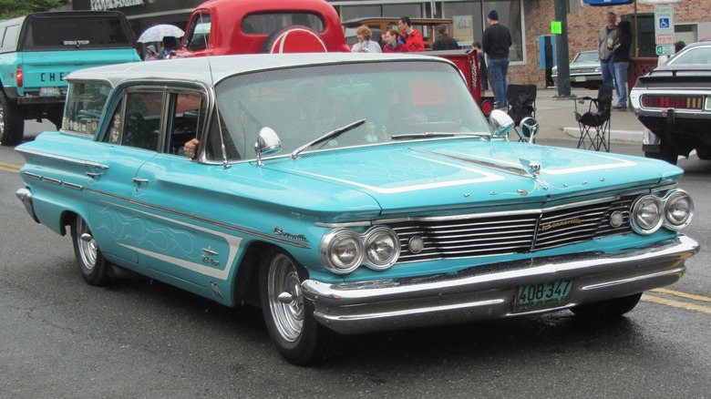 Teal 1960 Pontiac Bonneville Safari on the road