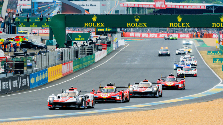 Cars racing at 24 Hours at Le Mans