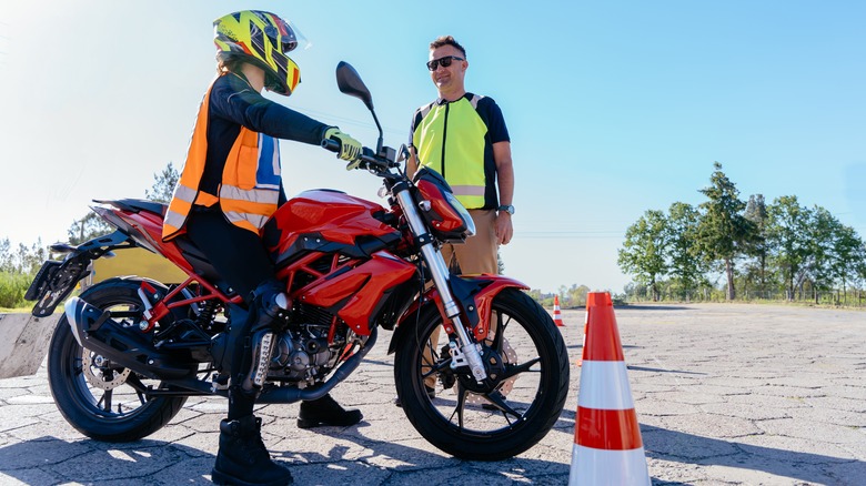 Trainee on a motorcycle